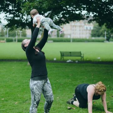 Mother holding baby up Mother holding baby up