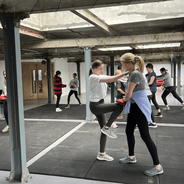 girls taking part in a self defence class in Edinburgh